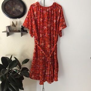 Orange floral high-low dress.